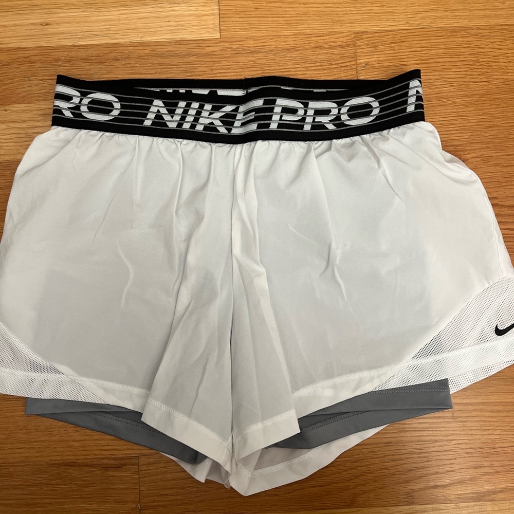 Never worn Nike 2-in-1 shorts